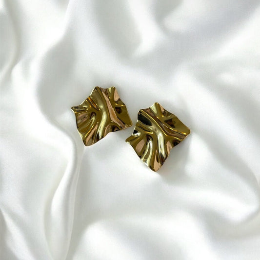 STATEMENT ABSTRACT GOLD STUDS
