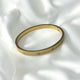 GOLD CLOVER BANGLE
