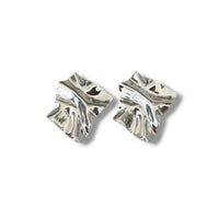 STATEMENT ABSTRACT SILVER STUDS