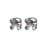 SILVER DAINTY ABSTRACT STUDS